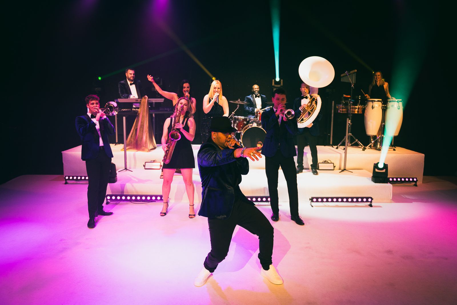 24K Brass Collective performing on stage